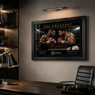 Tyson vs Ali boxing wall art displayed above a timber desk in a premium home office with dark shelving.