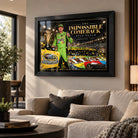 Kyle Busch NASCAR wall art displayed in a contemporary living room above a neutral sofa in a black frame.