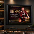 Wally Lewis wall art displayed in a dark man cave with timber shelving, leather seating and the black framed Queensland tribute.