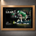 Oak framed The Leap Saquon Barkley wall art featuring the Philadelphia green football design.