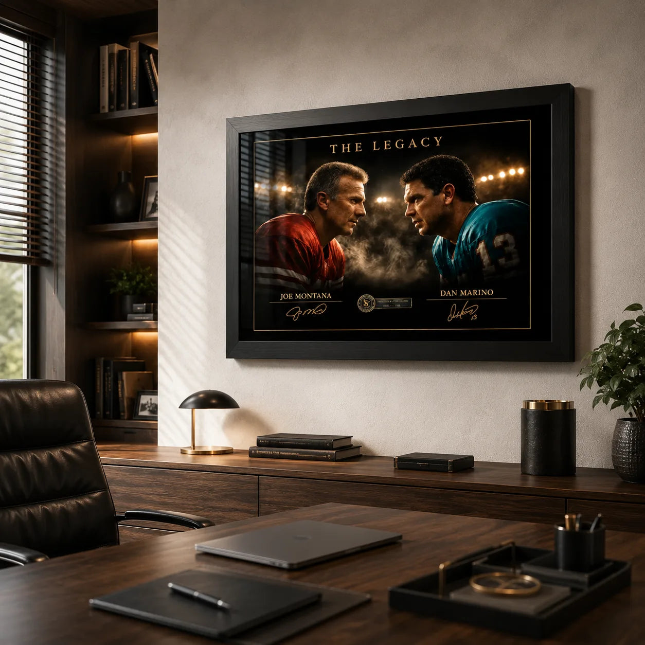 Joe Montana vs Dan Marino NFL wall art in a black frame above a desk in a warm wood-panelled office.