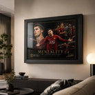 Living room mockup of The Mentality Cristiano Ronaldo framed sports art with red and gold collector detail for fans.