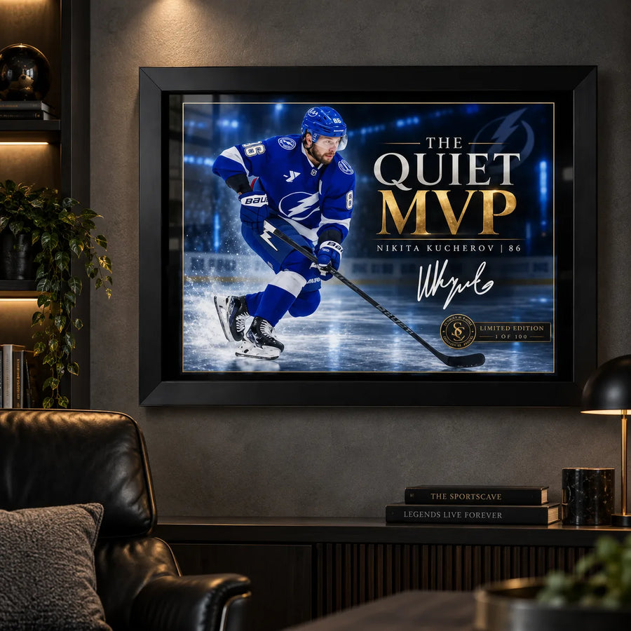 Nikita Kucherov wall art displayed in a dark man cave setting with a black frame and collector-style hockey presentation.