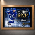 Oak framed Nikita Kucherov hockey wall art featuring The Quiet MVP design for a warm collector display.