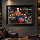 Jeff Gordon wall art displayed in a dark man cave setting with black frame and The Rainbow Crown NASCAR design.