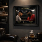 Black framed Jeter vs Ortiz baseball wall art displayed in a dark premium man cave with leather seating