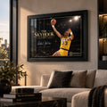 Kareem Abdul-Jabbar The Skyhook wall art displayed in a modern living room above a neutral sofa beside city windows.