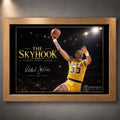 Oak framed Kareem Abdul-Jabbar The Skyhook basketball wall art with the gold-on-black collector design and No. 33 tribute.