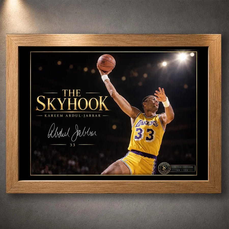 Oak framed Kareem Abdul-Jabbar The Skyhook basketball wall art with the gold-on-black collector design and No. 33 tribute.