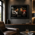 Tom Brady vs Joe Montana NFL wall art in a dark premium man cave with leather seating and bar cabinetry.