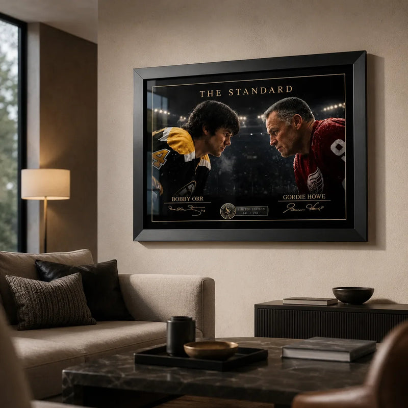 Black-framed Bobby Orr vs Gordie Howe hockey wall art displayed in a warm contemporary living room.