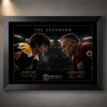 Bobby Orr and Gordie Howe face off in The Standard hockey wall art, presented in a premium black frame.