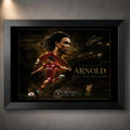 Trent Alexander-Arnold soccer wall art in a black frame with gold artwork details.