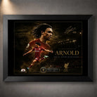 Trent Alexander-Arnold soccer wall art in a black frame with gold artwork details.