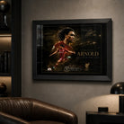 Trent Alexander-Arnold soccer wall art in a black frame mounted in a dark sports room.