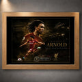 Trent Alexander-Arnold soccer wall art in an oak frame with gold artwork details.