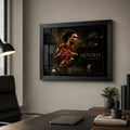 Trent Alexander-Arnold soccer wall art in a black frame shown on an office wall.