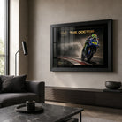 Valentino Rossi The Doctor wall art in a black frame displayed in a modern neutral living room.