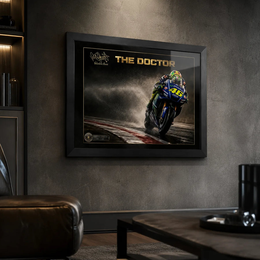 Black framed Valentino Rossi The Doctor motorsport wall art mounted in a dark premium man cave.