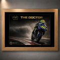 Oak framed Valentino Rossi The Doctor motorsport wall art featuring the #46 bike on a wet circuit.