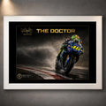 White framed Valentino Rossi The Doctor wall art featuring the #46 motorcycle racing through spray.