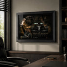 Framed motorsport wall art displayed in a premium home office with dark shelving, desk styling and natural light.