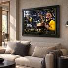 William Contreras Crowned edition in a black frame above a light fabric sofa in a sunlit living room.