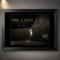 Willie Mays The Catch baseball wall art shown in a premium black frame against a softly lit concrete wall.