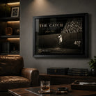 Willie Mays The Catch framed baseball wall art mounted in a dark premium man cave with leather seating.