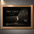 Willie Mays The Catch baseball wall art presented in a natural oak frame against a textured gallery wall.