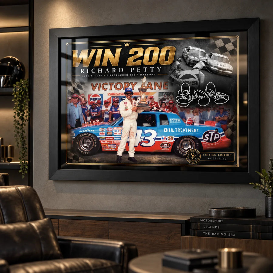Richard Petty Win 200 wall art displayed in a dark motorsport man cave with black framing.
