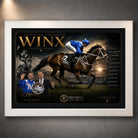 White framed Winx horse racing wall art featuring the champion mare and jockey in a dark gold collector design.