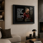 Zlatan Ibrahimovic soccer wall art in a black frame displayed above a sofa in a modern living room.